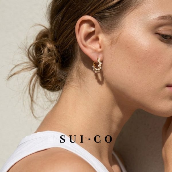 Model wearing Celeste Pearl Hoops