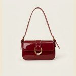 Elara mini tote bag in glossy wine red and matte black sui-co