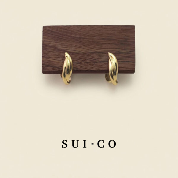 Nerelle twisted coil clip on earrings in gold tone sui-co