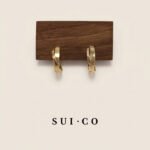 Kira Crossover Half-Hoop Earrings: Minimalist & Unique