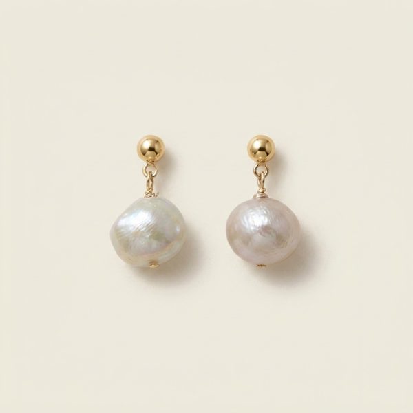 Lula natural baroque pearl earrings in white and gold sui-co